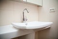 Modern bathroom sink in white ceramic Royalty Free Stock Photo