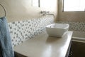 Modern bathroom sink with white mosaics Royalty Free Stock Photo