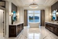 A modern bathroom with a glass shower enclosure, sleek fixtures, and natural stone tiles. Royalty Free Stock Photo