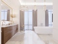 Modern bathroom with vanity and a mirror in a gold frame with sconces on the wall, a low table with decor, shower and a Royalty Free Stock Photo