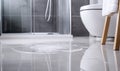 Modern Bathroom with Water Spill on the Floor Royalty Free Stock Photo