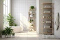 Modern bathroom in white tiles in a minimalist style with a closet with towels and green plants Royalty Free Stock Photo