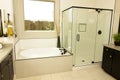 Modern Bathroom With Bath Tub And See Through Glass Shower Royalty Free Stock Photo
