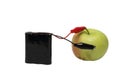 Modern battery that is charged by green apple Royalty Free Stock Photo