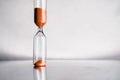 Modern beautiful hourglass with bright background for copy space. Hourglass time passing concept for business deadline Royalty Free Stock Photo