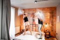 Modern bedroom with blurred woman Royalty Free Stock Photo