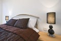 Modern bedroom detail with king size bed Royalty Free Stock Photo