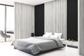 Black and wooden bedroom, side Royalty Free Stock Photo