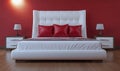 Modern bedroom interior with a white bed, red pillows, and nightstands against a red wall Royalty Free Stock Photo