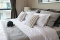Modern bedroom with striped pillows Royalty Free Stock Photo
