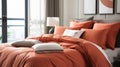 A modern bedroom with sunsetinspired bedding featuring a rustcolored duvet cover and peachy pillow shams.