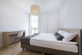 Modern Bedroom in white and beige color Royalty Free Stock Photo