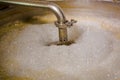 Modern beer plant brewery , with brewing kettles, vessels, tubs and pipes made of stainless steel, in a beer plant in Royalty Free Stock Photo