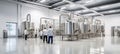 Modern beer production lab technicians analyze samples in stainless steel brewery for precision