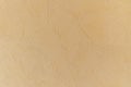 Modern beige background, texture plaster patterns. yellowish tint. Royalty Free Stock Photo