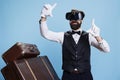 Modern bellboy using vr glasses Royalty Free Stock Photo