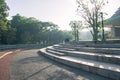 Modern benches and concrete stairway park corner bench seat for sitting. For relaxing in a landscaped park Royalty Free Stock Photo