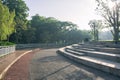 Modern benches and concrete stairway park corner bench seat for sitting. For relaxing in a landscaped park Royalty Free Stock Photo