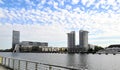 Modern Berlin : beautiful buildings, molecule man sculpture and cloudy sky