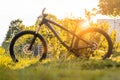 Modern bicycle. Black mountain bike at sunset. Trail bike. Hardtail enduro mtb. Royalty Free Stock Photo