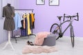 Modern bicycle in stylish dressing room Royalty Free Stock Photo