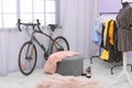 Modern bicycle in stylish dressing room Royalty Free Stock Photo