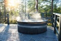 Modern big barrel outdoor hot tub Royalty Free Stock Photo