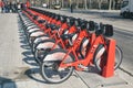 Modern bikes to rent in a Barcelona bike station in Spain in a sunny day