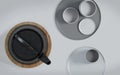 Modern black cast iron teapot and tea cups and a minimalist table white. Top view, set for tea time. 3d rendering Royalty Free Stock Photo