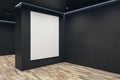 Modern concrete gallery interior with wooden parquet flooring and blank white mock up poster on wall. Art and display Royalty Free Stock Photo