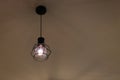 Modern Black decorative lamp hanging from the ceiling Royalty Free Stock Photo