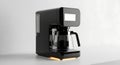 Sleek Black Drip Coffee Maker with Illuminated Base - Modern Kitchen Appliance Royalty Free Stock Photo