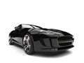 Modern black fast luxury sports car - front view extreme closeup shot Royalty Free Stock Photo