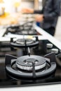 Modern black gas stove on countertop in kitchen Royalty Free Stock Photo