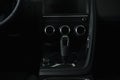 Modern black gear shift near buttons in luxury car. Royalty Free Stock Photo