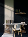 Modern black home workspace interior design with copy space on white tabletop, white chair Royalty Free Stock Photo