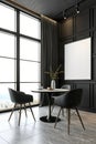 Modern black interior room with table and chairs Royalty Free Stock Photo