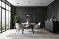 Modern black interior room with table and chairs Royalty Free Stock Photo
