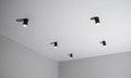 Modern black LED ceiling lights in a room on the ceiling, background Royalty Free Stock Photo