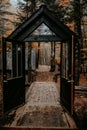 Modern black loft house, steel frame pavilion, glass doors, and scenic nature view