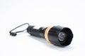 Modern black metal flashlight isolated on white background Royalty Free Stock Photo