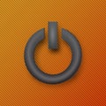 Modern black metallic power button on orange background