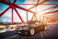 Modern black metallic sedan car on the bridge road. Generic desing, brandless. Royalty Free Stock Photo