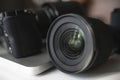 Modern black mirroless camera and prime lense Royalty Free Stock Photo