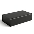 Modern black rectangular box with vented sides on a white background Royalty Free Stock Photo