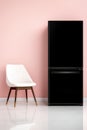 Modern black refrigerator and white chair against pink wall for kitchen decor Royalty Free Stock Photo