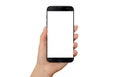 Modern black smart phone in woman hand. Isolated white screen for mockup Royalty Free Stock Photo