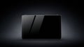 Sleek Black Tablet Device on Dark Gradient Background Royalty Free Stock Photo