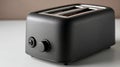 Modern black toaster on a kitchen countertop Royalty Free Stock Photo