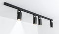 Modern Spotlight Track Lighting on a White Ceiling Royalty Free Stock Photo